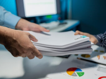 Hand a pile of important documents to a co-worker, Forward a sum